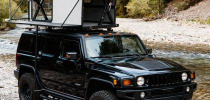 Side view of Automatic Pop Up Roof Top Tent fully set up on Jeep