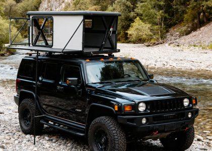 Side view of Automatic Pop Up Roof Top Tent fully set up on Jeep