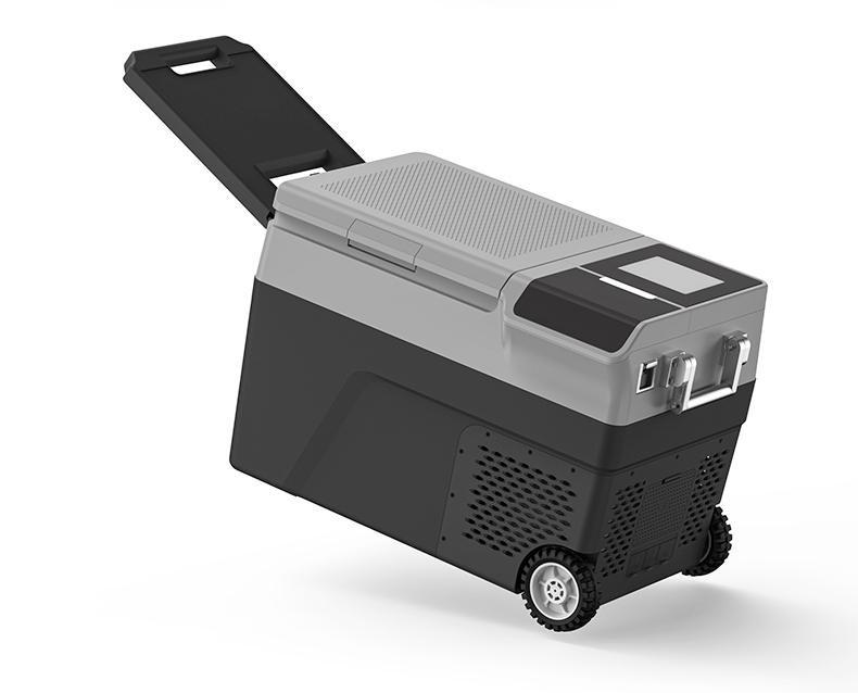 F1 Portable 12V Fridge with Built-in Ice Maker | 38L Compressor Freezer with Solar Charging 3 Exterior view of the closed F1 portable solar fridge, emphasizing its rugged build quality, digital control panel, foldable tow handle, and heavy-duty wheels for easy mobility.