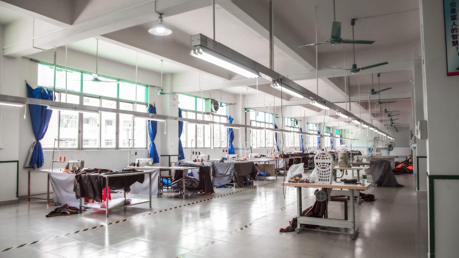 Precision fabric cutting workshop at Everlead Outdoor, ensuring exact dimensions and patterns for soft shell and hard shell roof top tents.