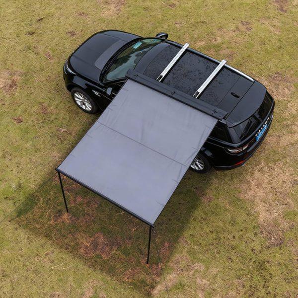 Home 9 Fully deployed retractable car side awning featuring an innovative auto-roll mechanism for instant setup and massive shade coverage.