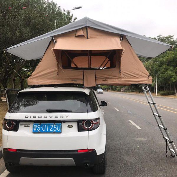 Spacious fold-out soft shell roof top tent with large sleeping footprint, ideal for family camping trips on SUVs.