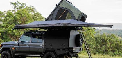 Comprehensive vehicle awning and shelter solutions including retractable side awnings and freestanding batwing models.