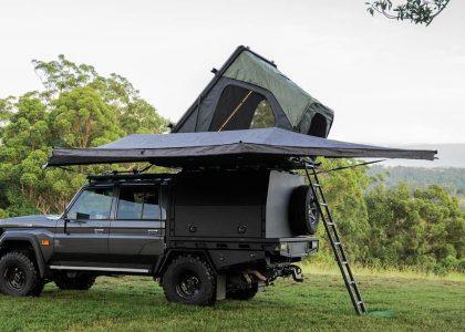 Comprehensive vehicle awning and shelter solutions including retractable side awnings and freestanding batwing models.