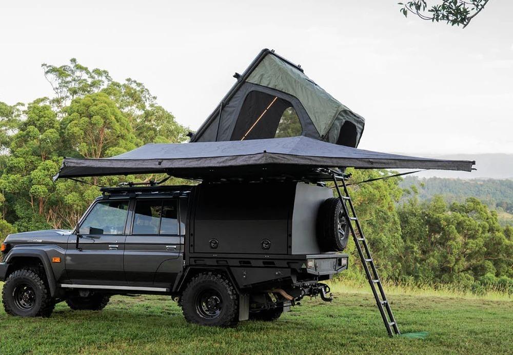 Comprehensive vehicle awning and shelter solutions including retractable side awnings and freestanding batwing models.