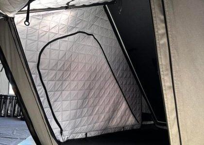 Interior view of a custom rooftop tent featuring premium thermal insulation cotton.