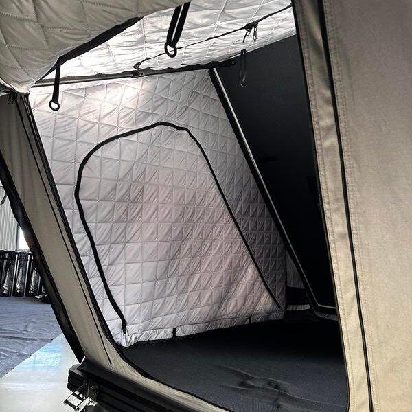 Interior view of a custom rooftop tent featuring premium thermal insulation cotton.