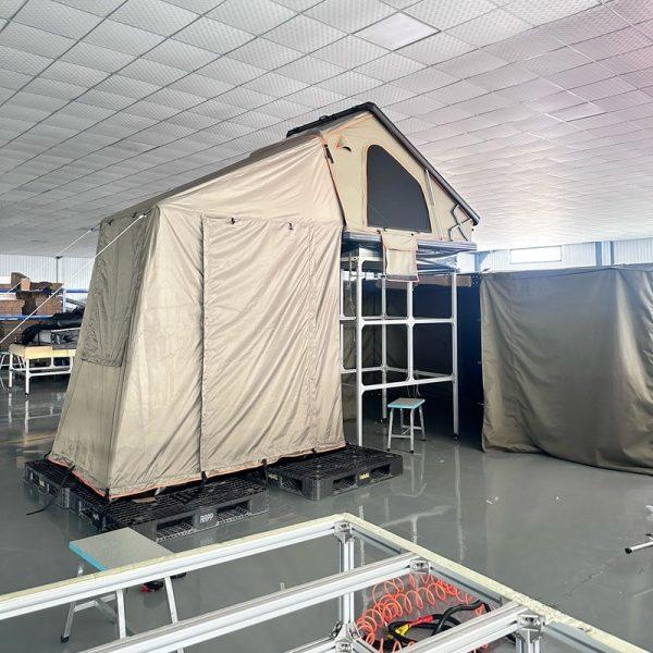 X-frame reinforced wedge hard shell rooftop tent with premium annex room.