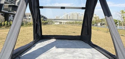 A high-end triangular hard-shell rooftop tent from the Stargazing Series, fully deployed on a 4x4 vehicle. The clear upper cover allows for an immersive, panoramic view of the night sky, ideal for stargazing.